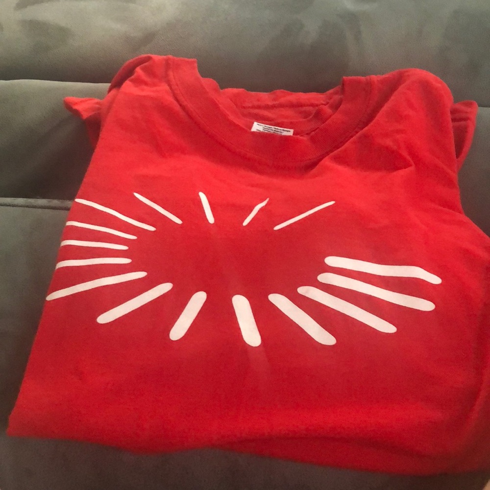 Red T says Opsource on back white lines on front